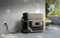 Preview: Anker SOLIX F3000 Powerstation mit einem BP3000 Erweiterungsakku gestapelt, an Steckdose und Solarmodul